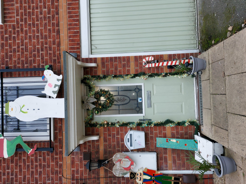 Image for 38. This is the outside of my house we handmade the Grinch, the snowman and the snow dog merry Christmas