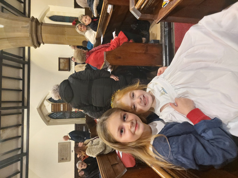 Image for 81. My two daughters last year at the church's Christingle
