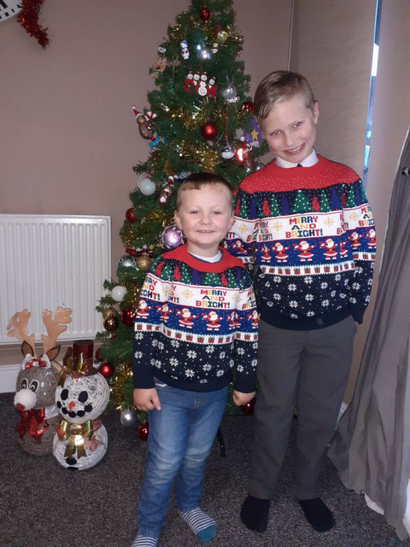 Image for My boys wearing Xmas jumpers for last day of school & nursery