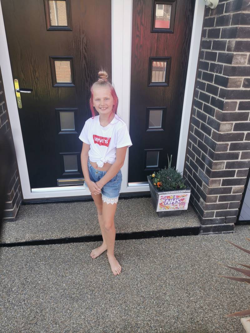 Main image for Maisie's rainbow hair shows support for NHS