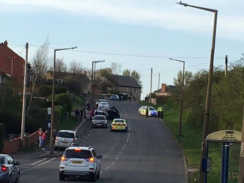 Main image for Car overturned after crash with parked vehicle