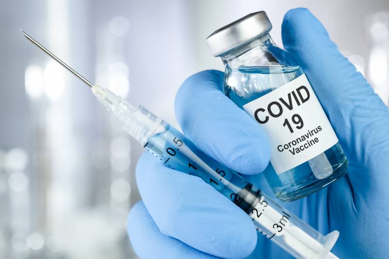 Main image for COVID-19 vaccines hold the key to the road back towards normality