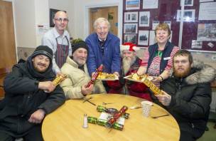 Turkey and trimmings: Action for Barnsley homeless provided meals for three locals fallen hard times, with thanks to Alan Sherrif and Jill Martin and guests from Barnsley Round Table. Picture Shaun Colborn