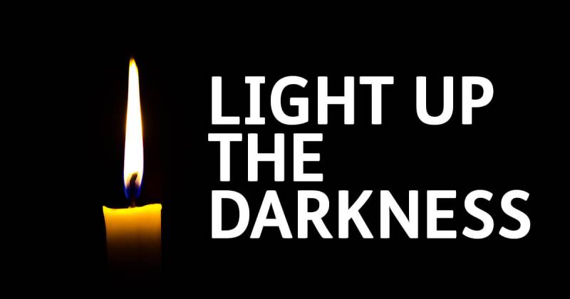 Main image for College students to light up the darkness for Holocaust Memorial Day