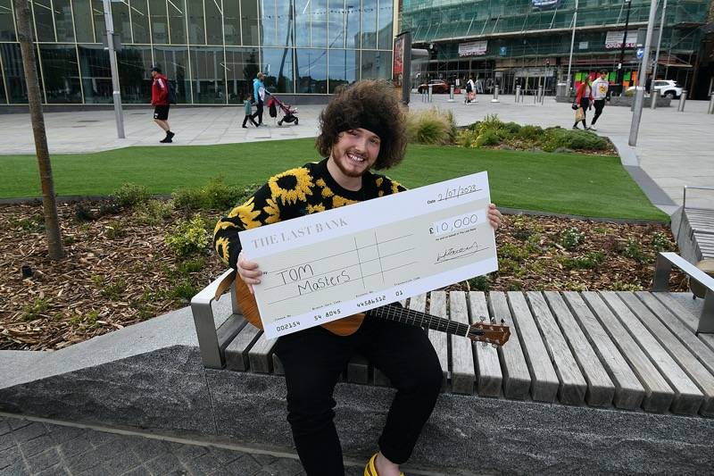 Main image for Tom takes £10k talent show prize