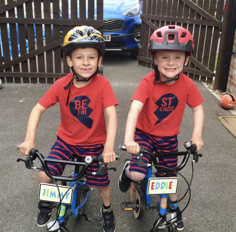 Main image for Young twins on track in bike trek