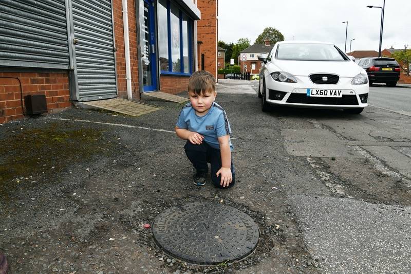 Main image for Youngster left shook up by fall into manhole