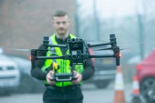 An officer with a drone used as part of the operation.