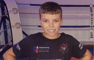 Main image for Young coach gets his black belt