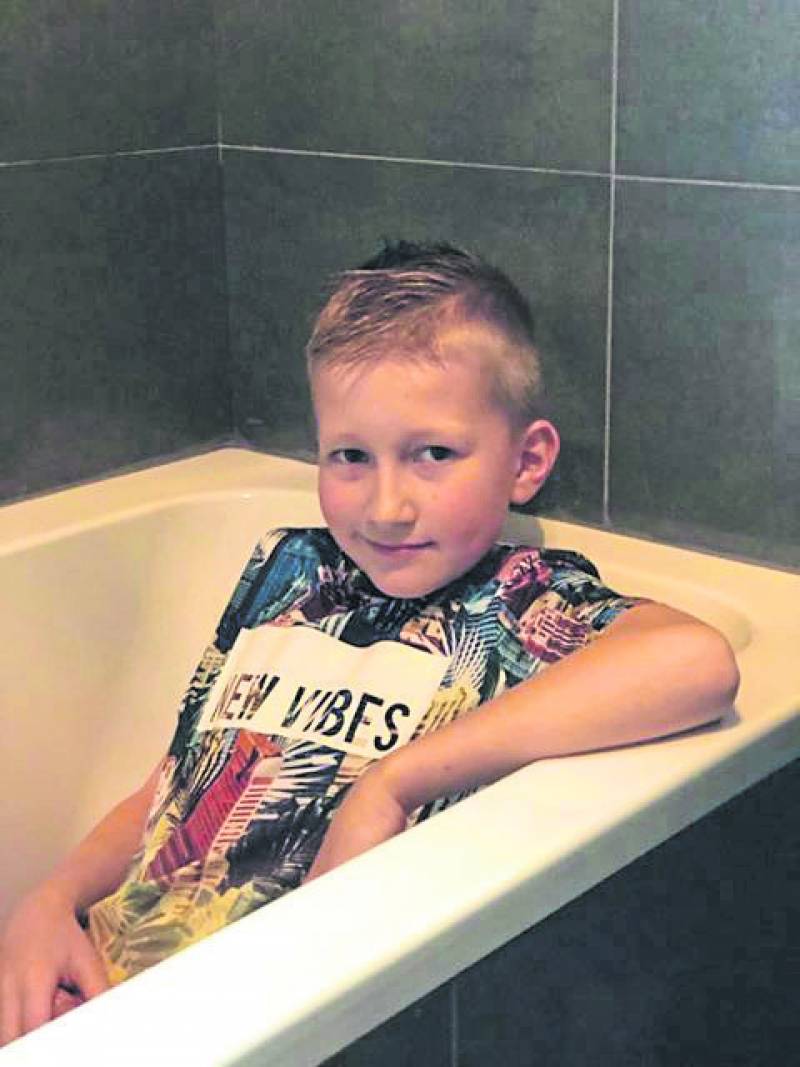 Main image for Young fundraiser spends night in bath