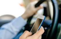 Main image for Tougher laws on mobile phone use while driving come in this week