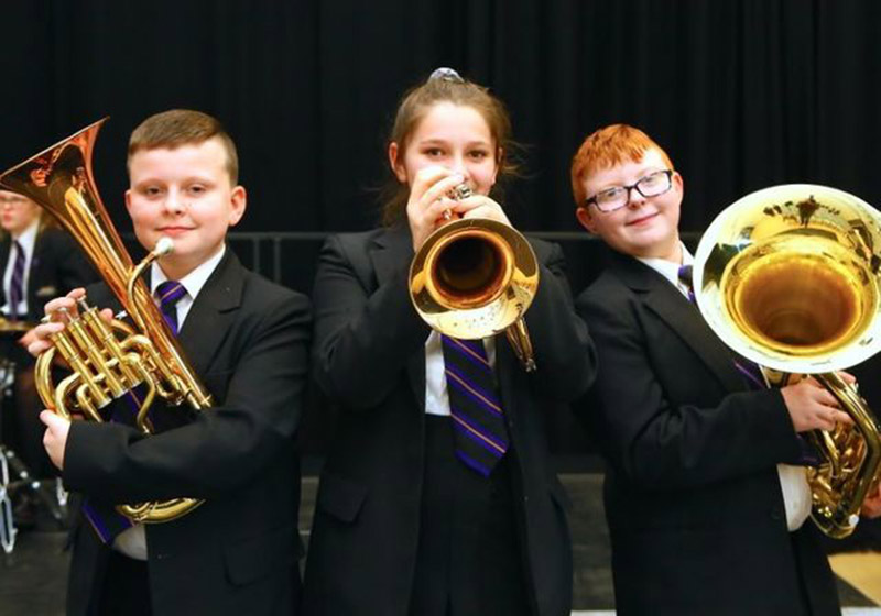 Main image for Students blowing their own trumpets